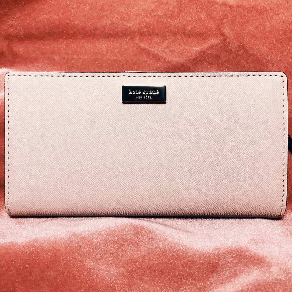 S O L D new kate spade pink wallet “stacy”